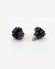Pair of black PILOTIS adjustment knobs, top view