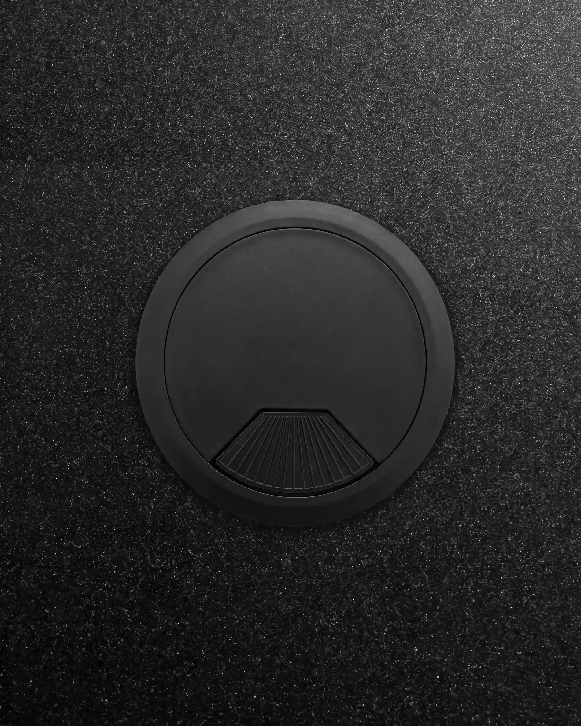 Matte black PILOTIS cable cover, flat panel with circular opening