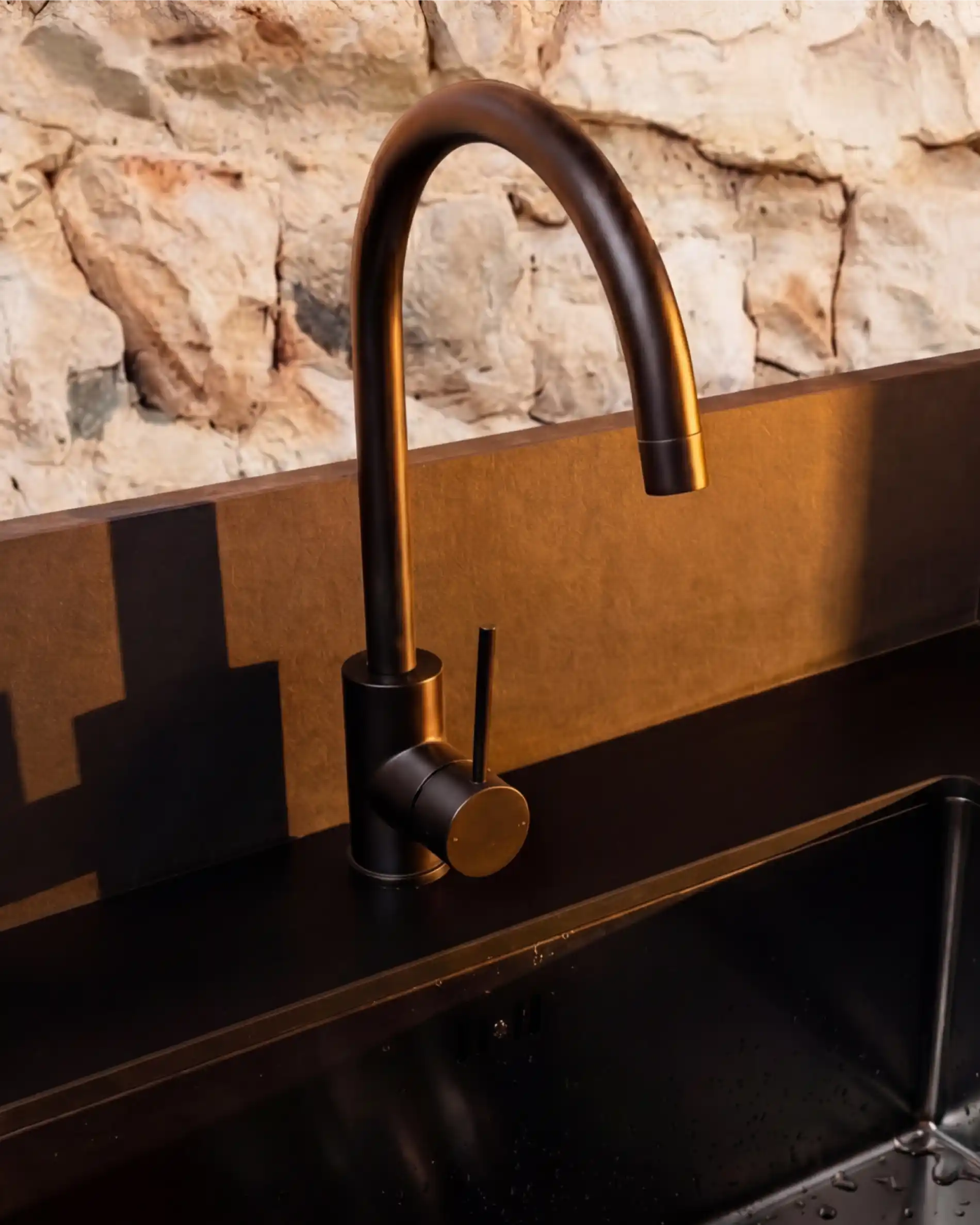 Matte black PILOTIS tap for sink module, product view