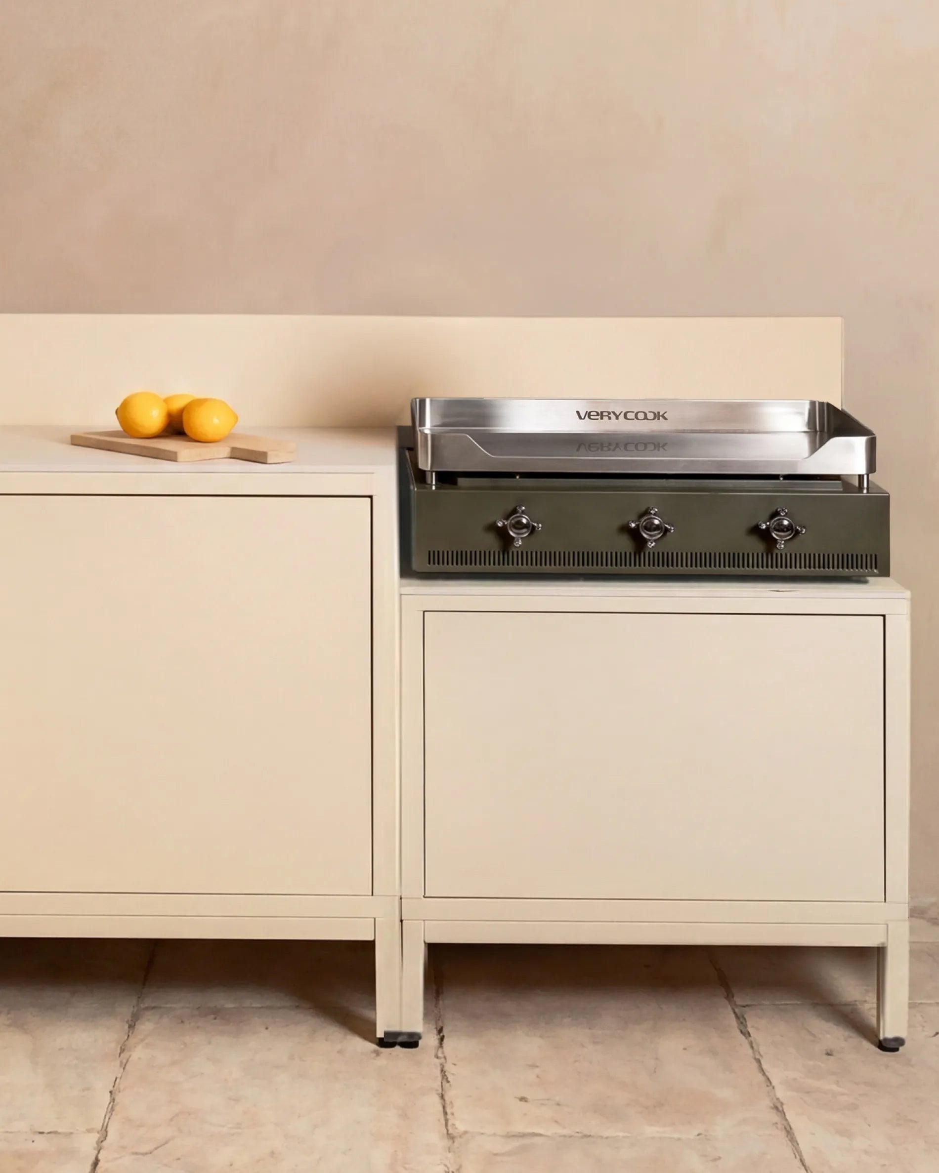 Verycook plancha installed in a cream beige PILOTIS cabinet, outdoor kitchen