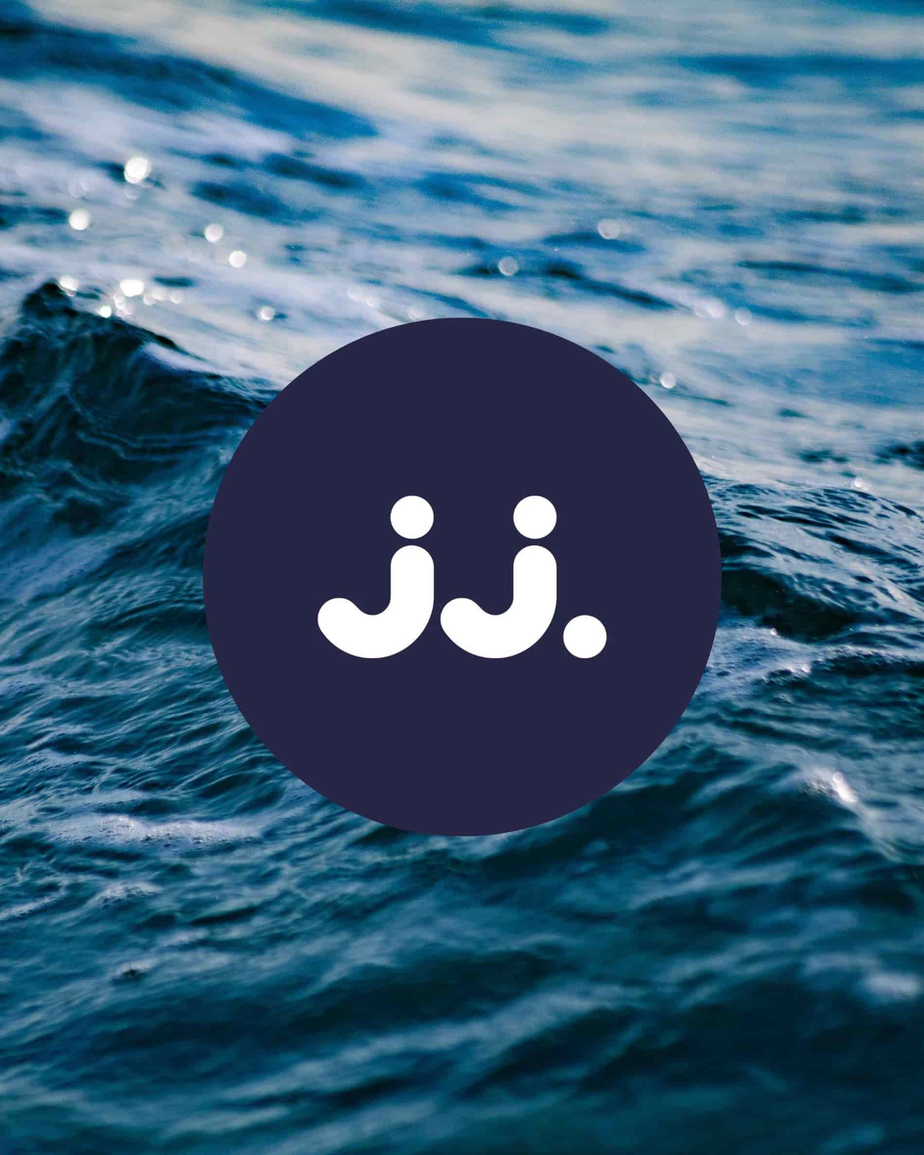 Ocean-inspired background with jj. logo, evoking the Lemongrass & Sea Salt scent