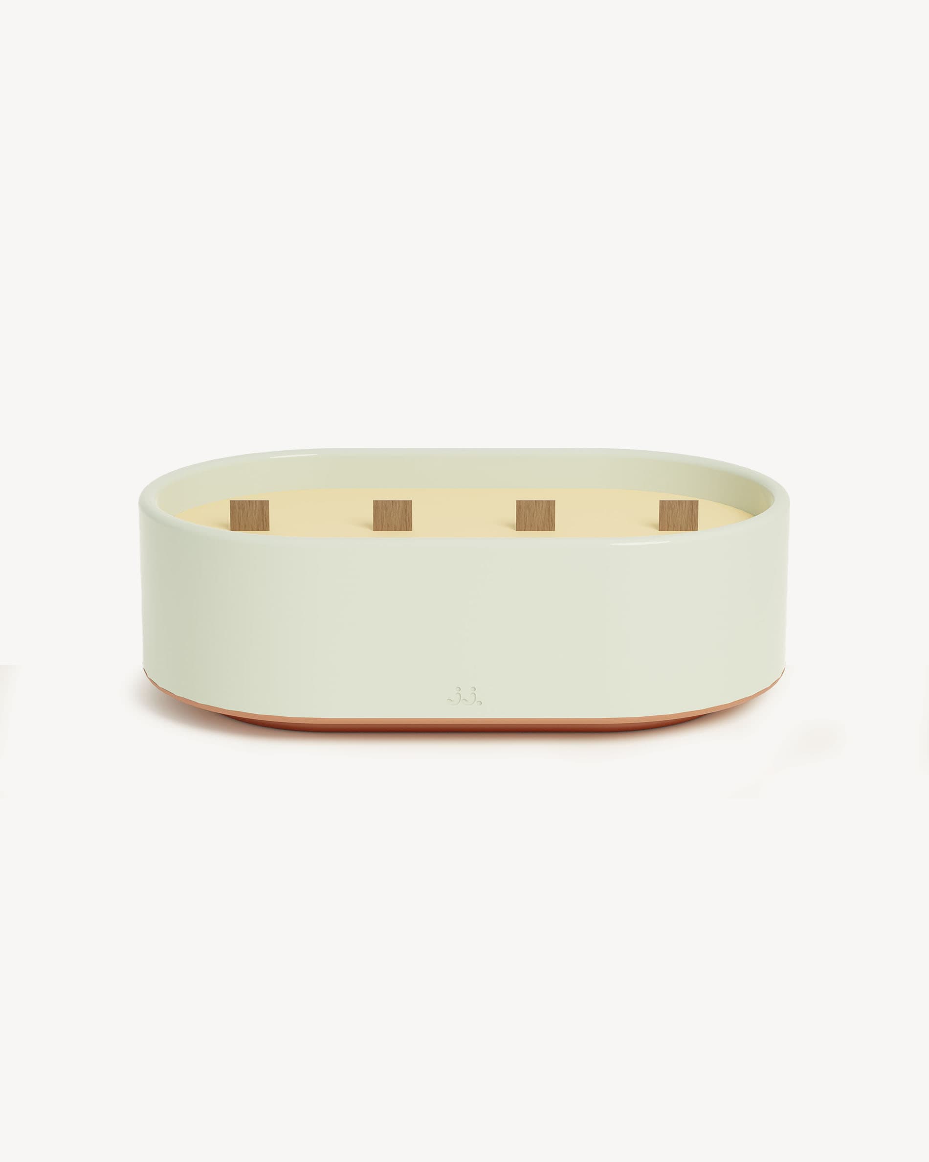 Totem L glazed ceramic candle in water green, scented with citronella and eucalyptus notes.