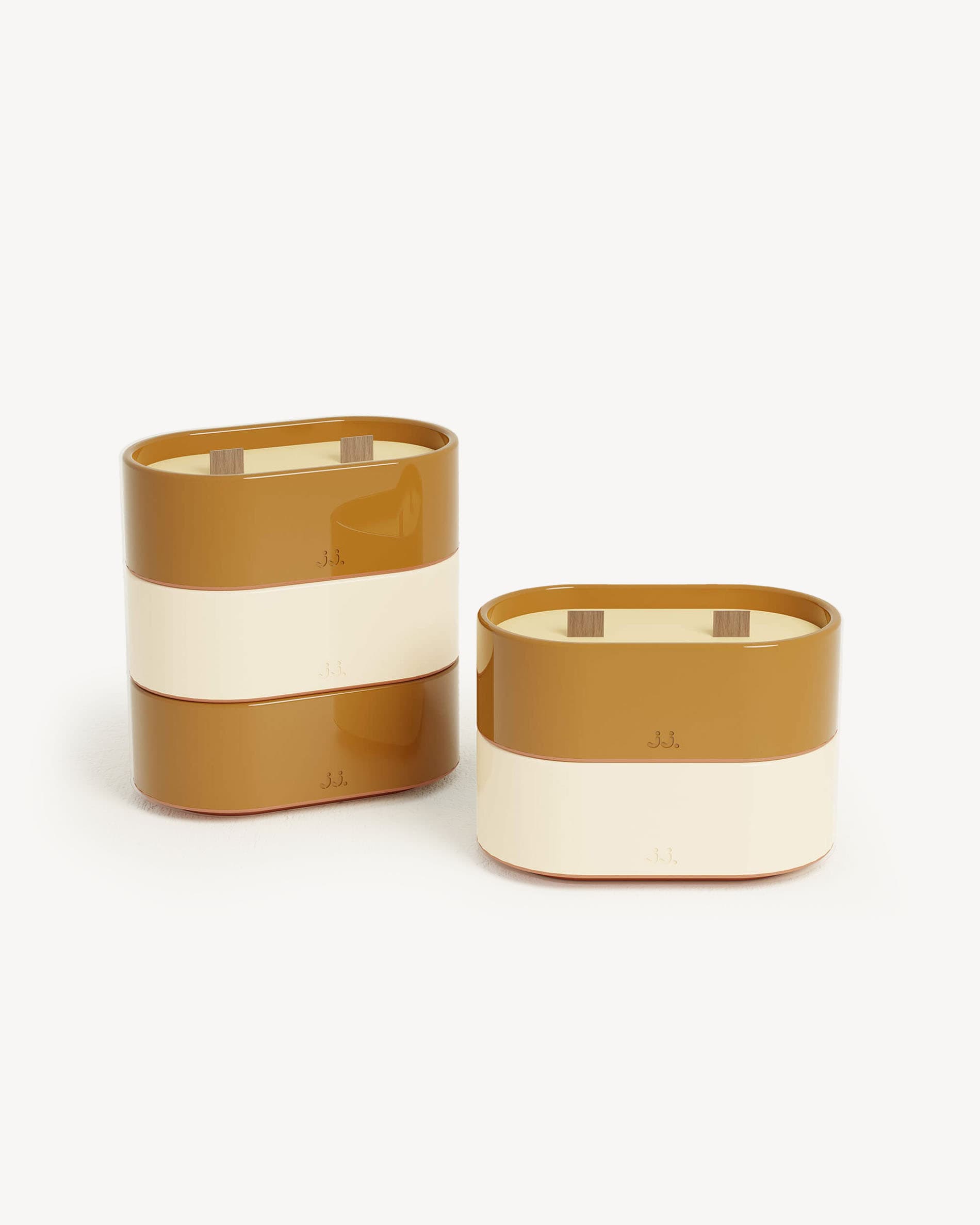 Totem L ceramic candle in ivory beige and sienna brown, scented with citronella and notes of orange blossom.