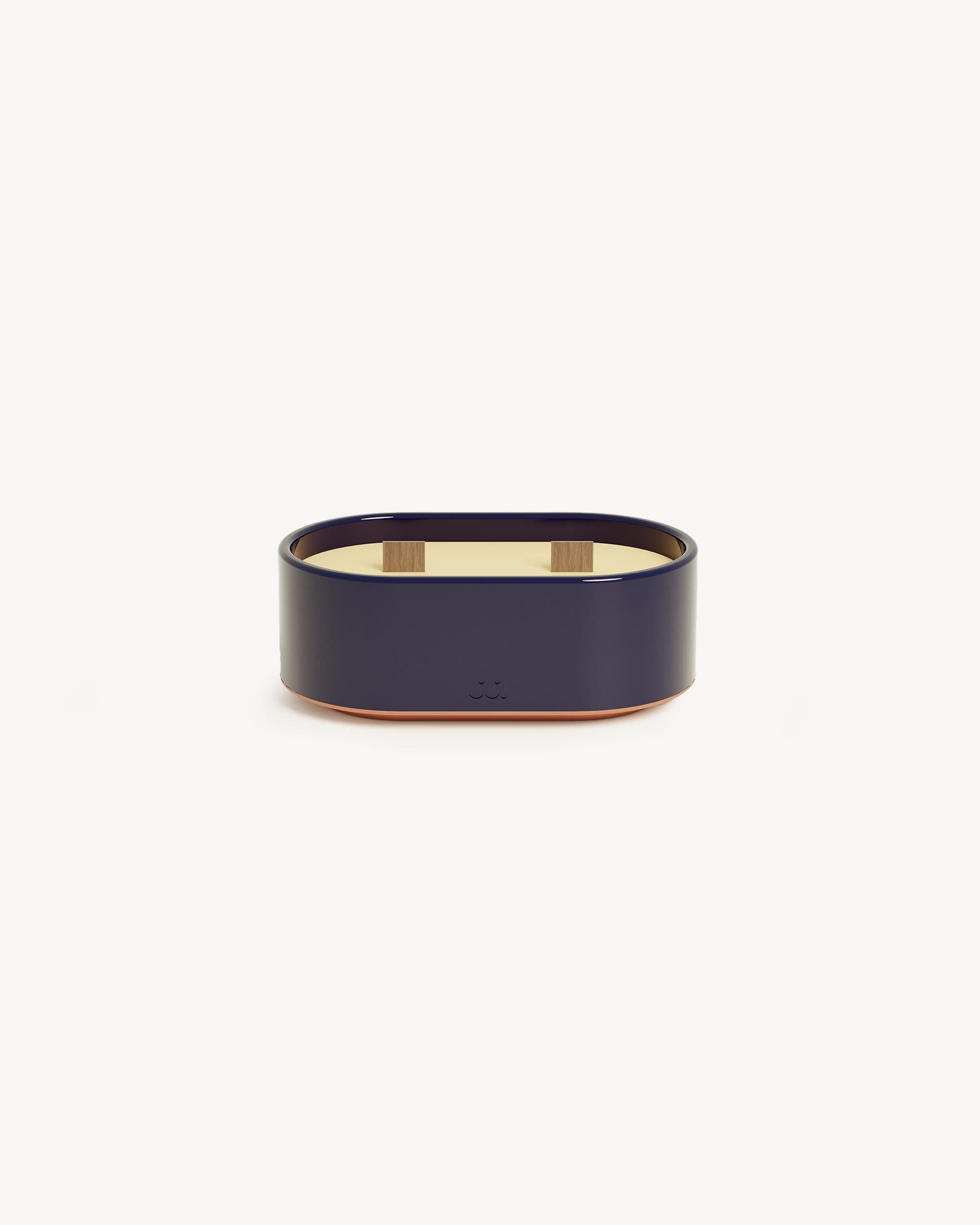 Totem S candle in navy blue glazed ceramic, scented with citronella and sea salt notes.