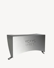 Cache en inox protégeant la charnière du kamado Kokko.