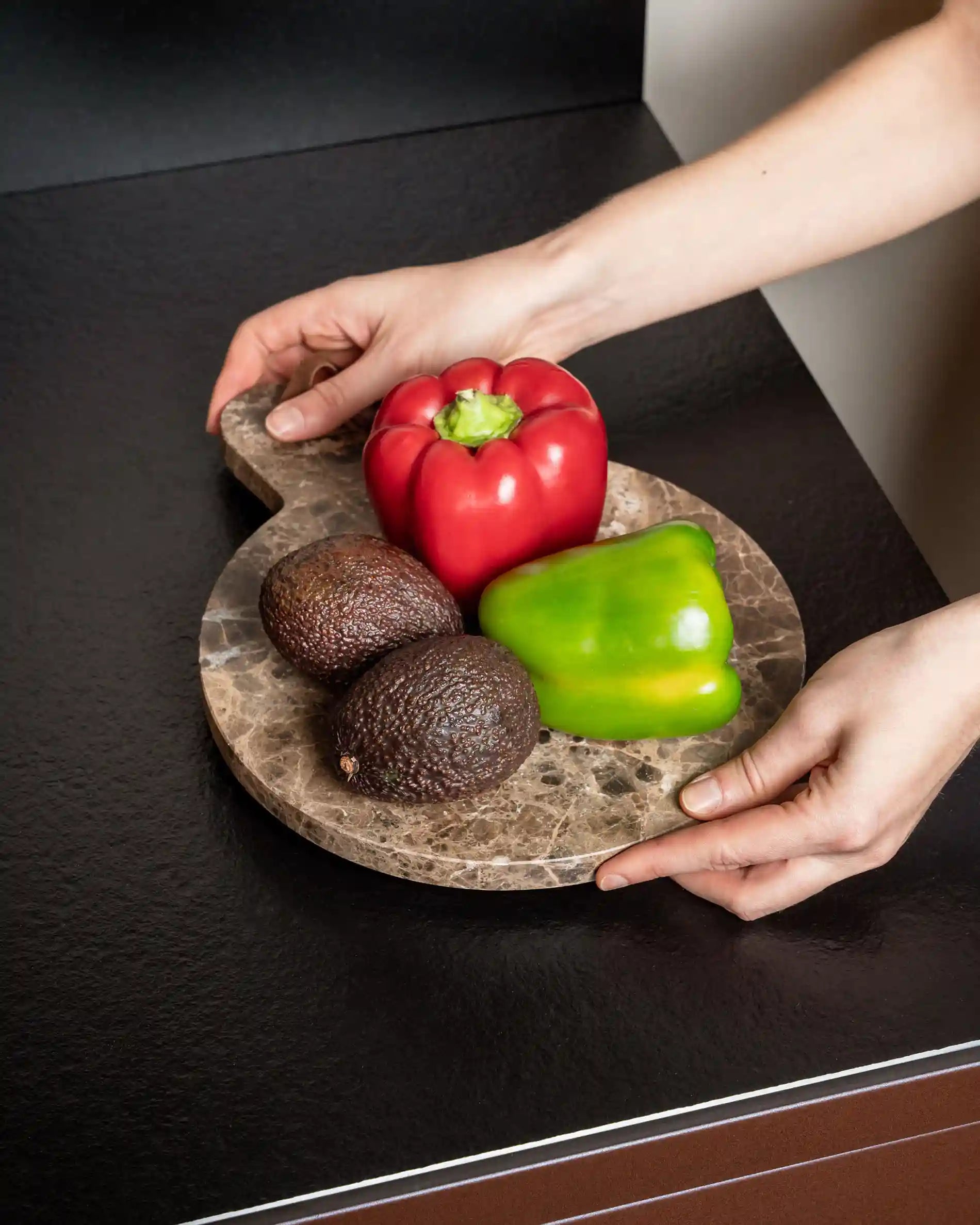 Tray with peppers and avocados on the worktop of Kokko outdoor kitchen