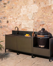 Kokko olive outdoor kitchen with black sink and integrated kamado