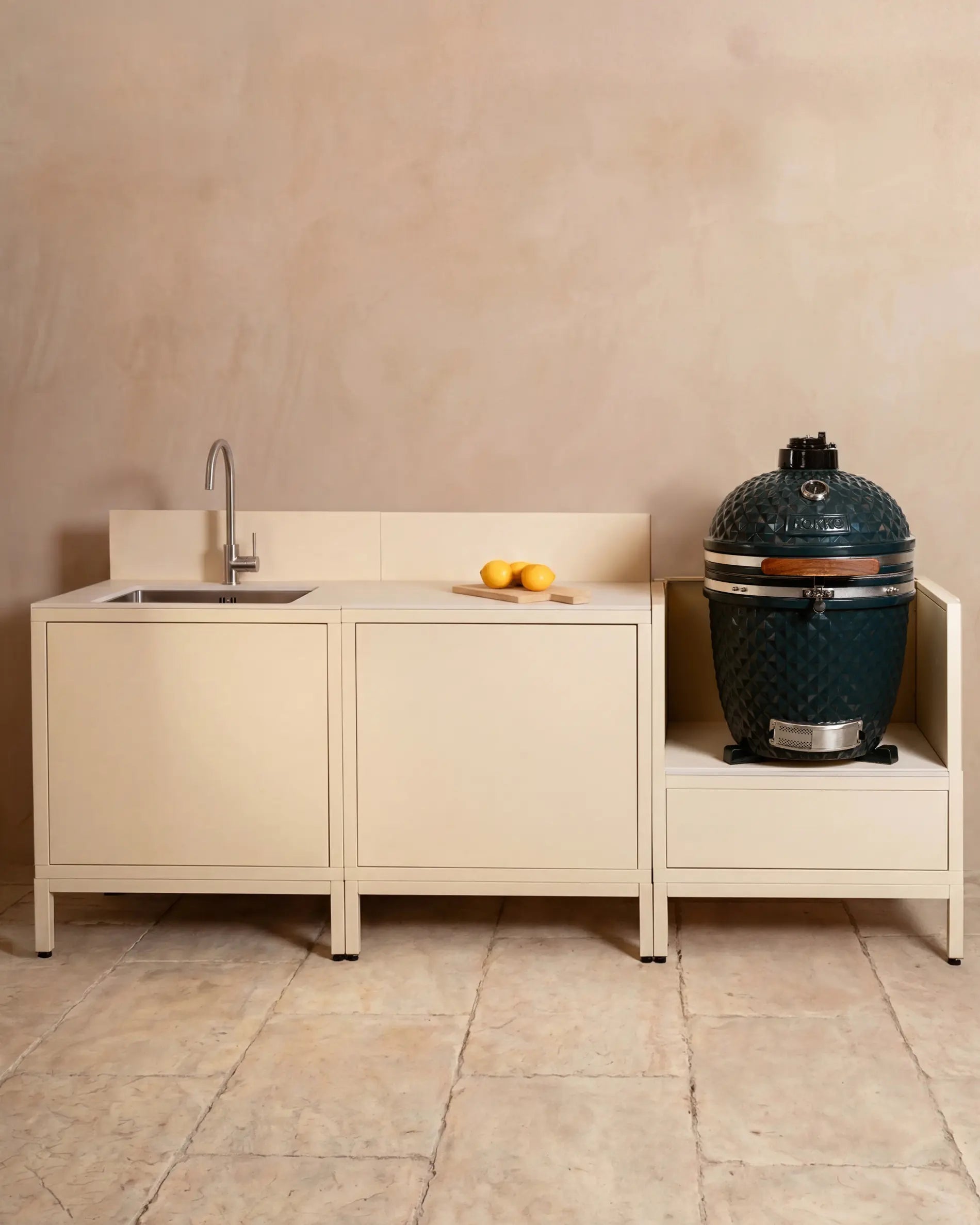 Kokko cream outdoor kitchen with sink, kamado, and three modules