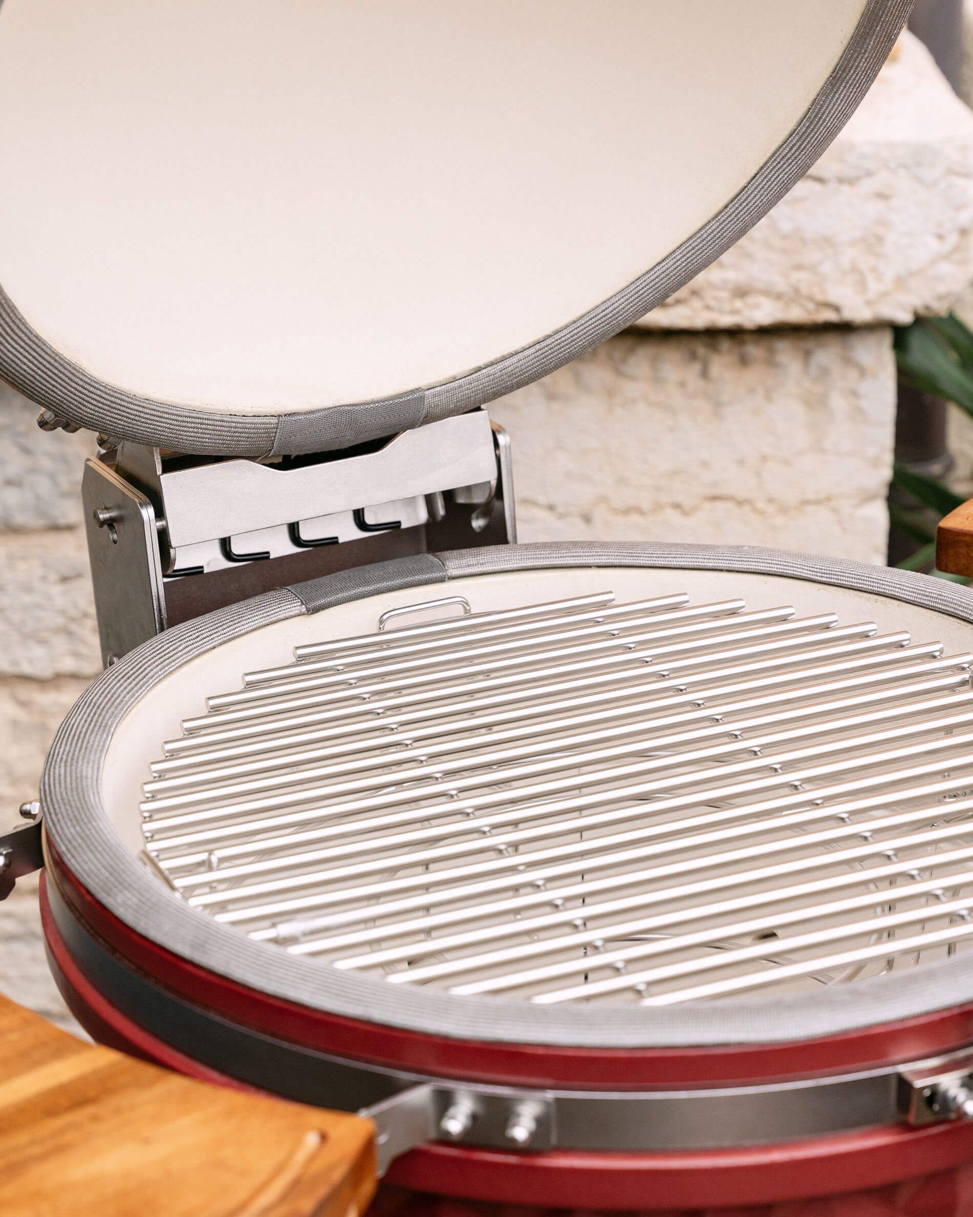 Stainless steel cooking grate installed inside a Kokko kamado.