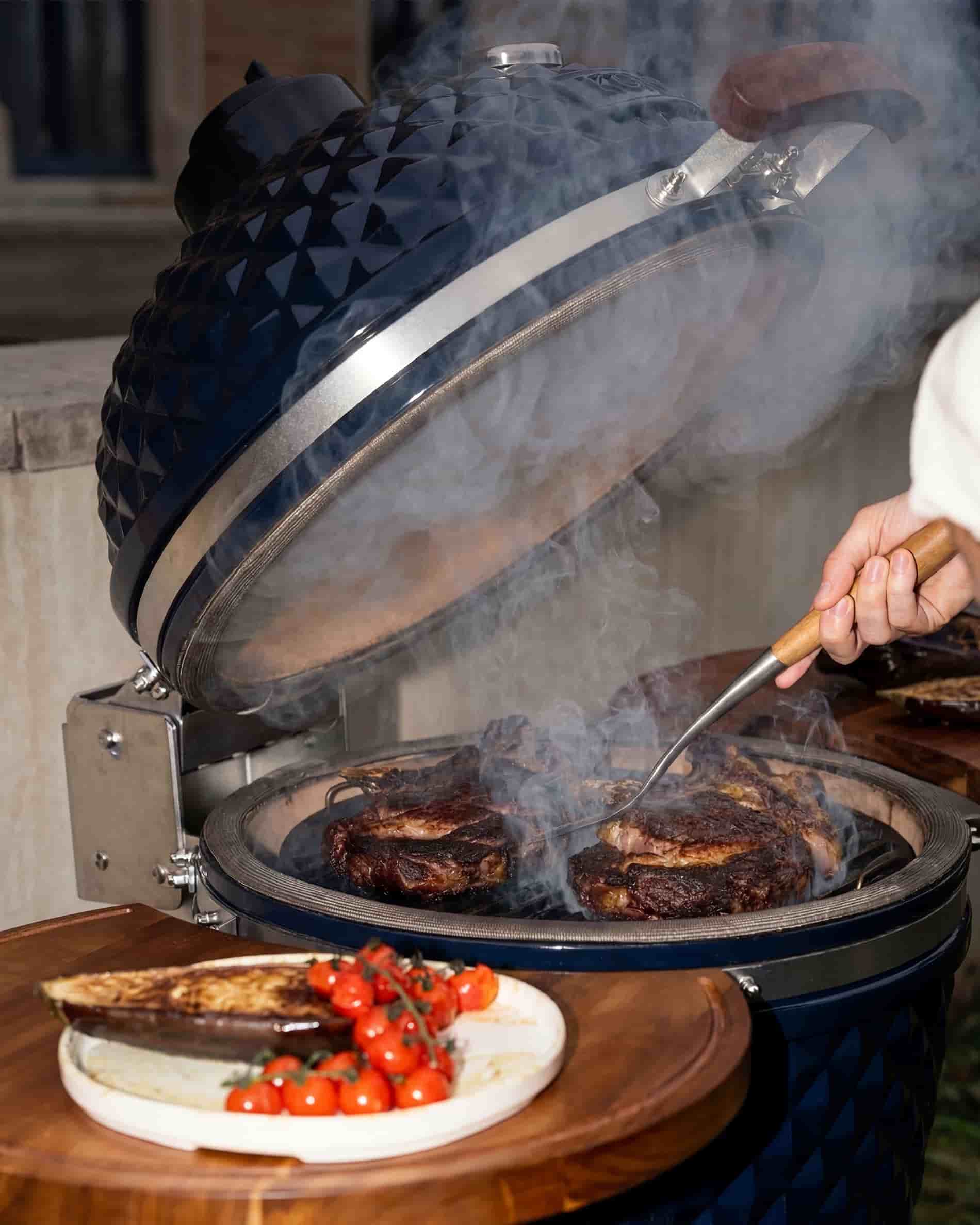 Ribeye steaks grilled on a Kokko kamado with perfect control.