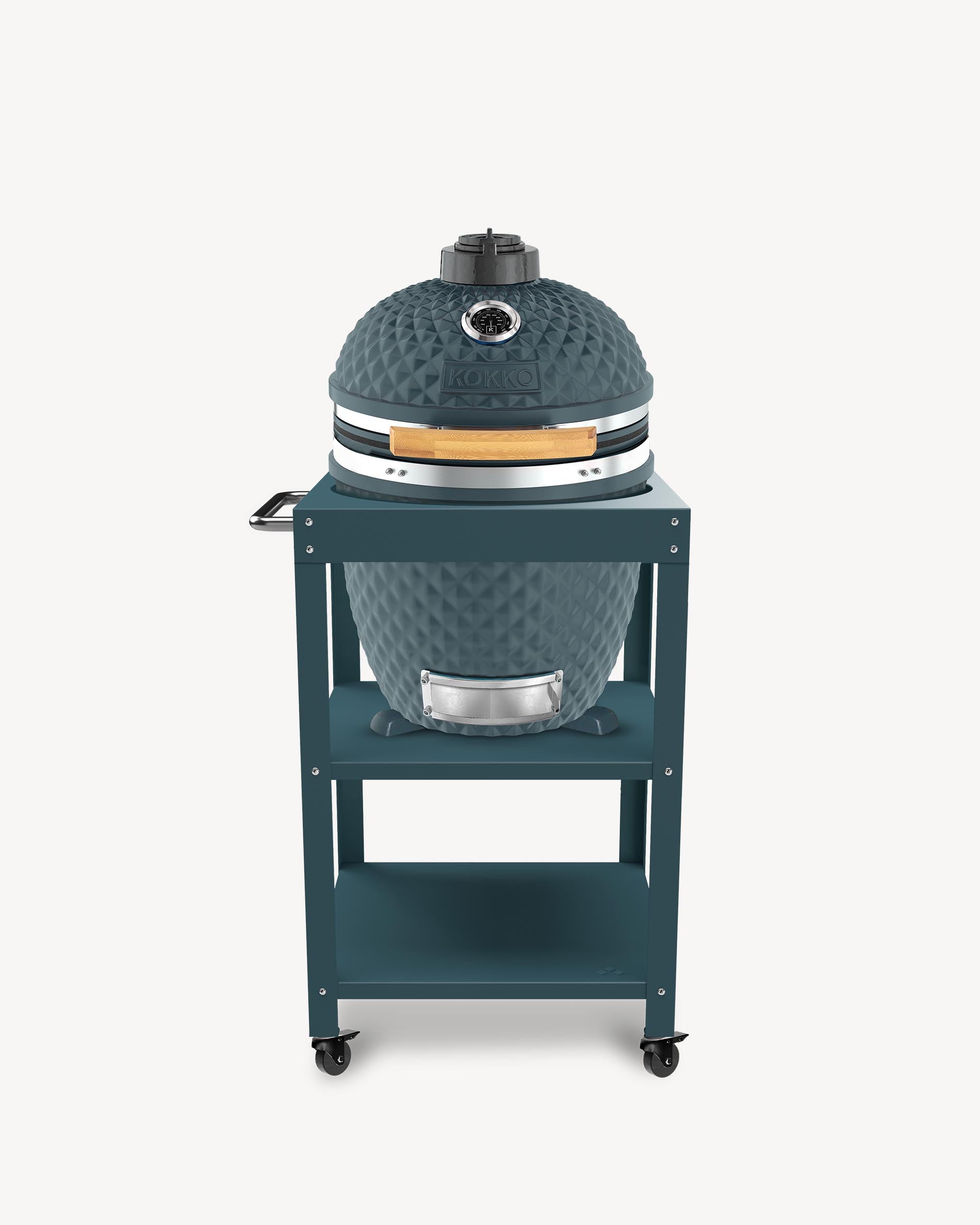 Kokko L 18-inch ocean blue kamado barbecue, set up on a trolley with storage and wheels.