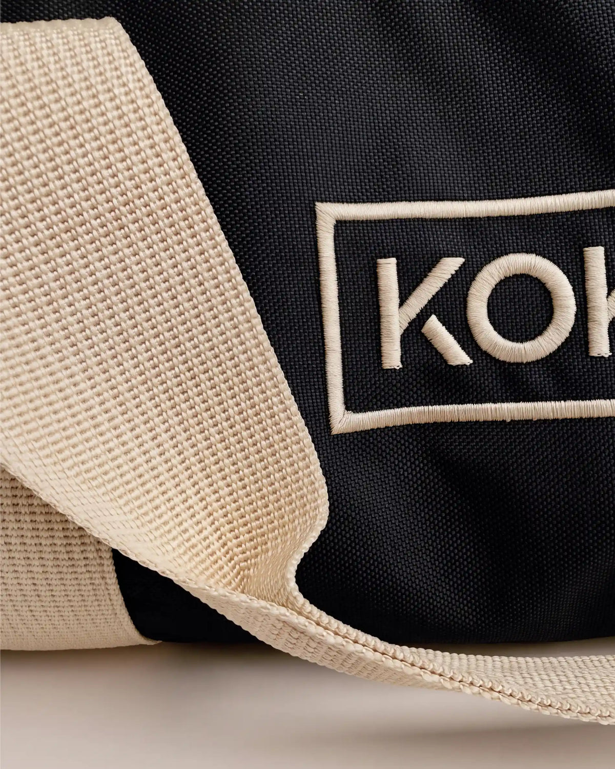 Embroidered Kokko logo detail on the cover