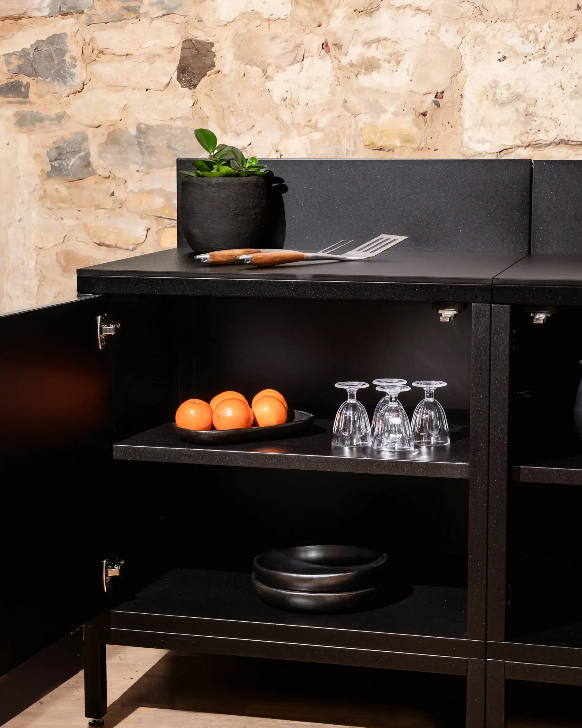 Kokko black storage module with open shelves and kitchen accessories