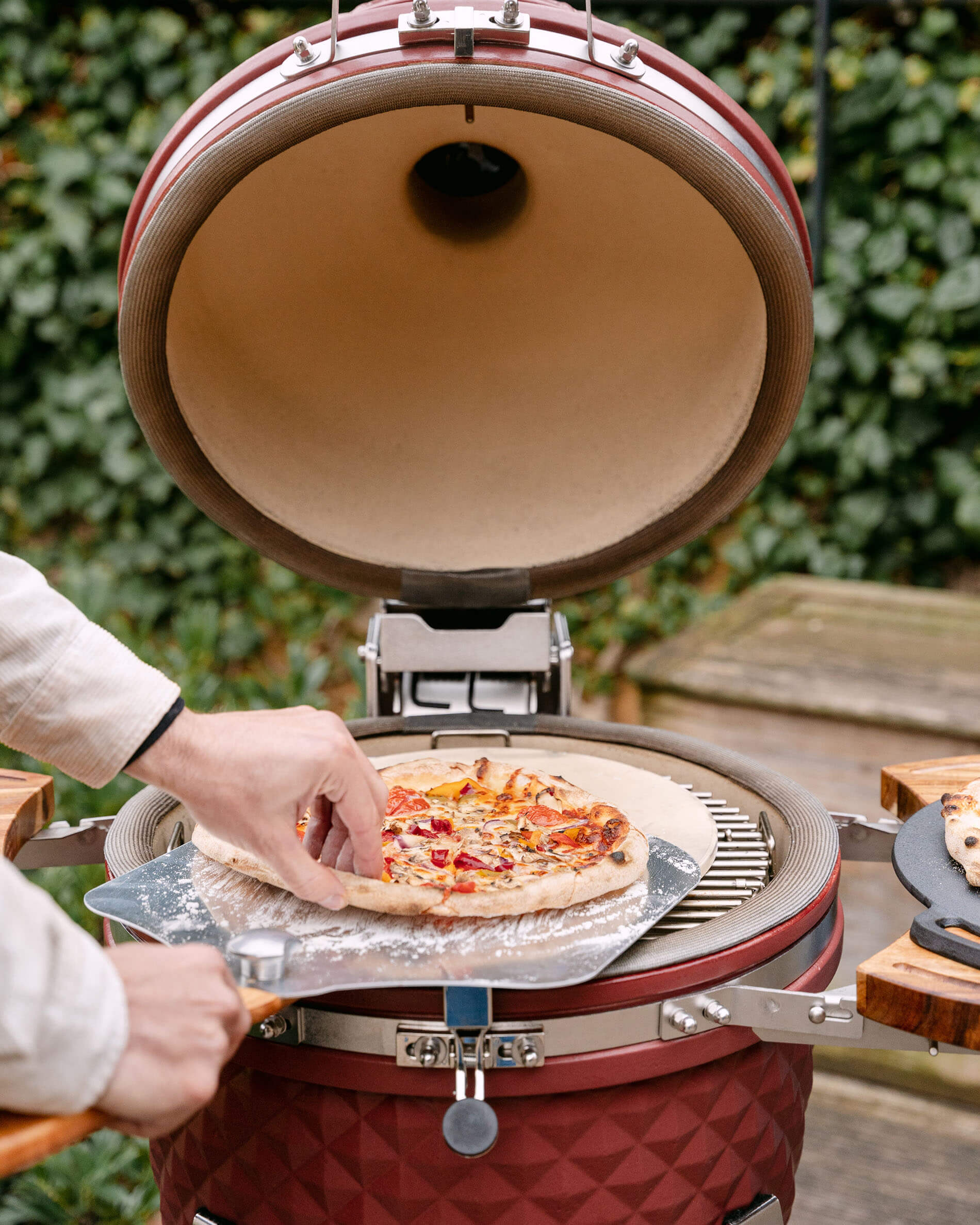 Stainless steel pizza peel and pizzas