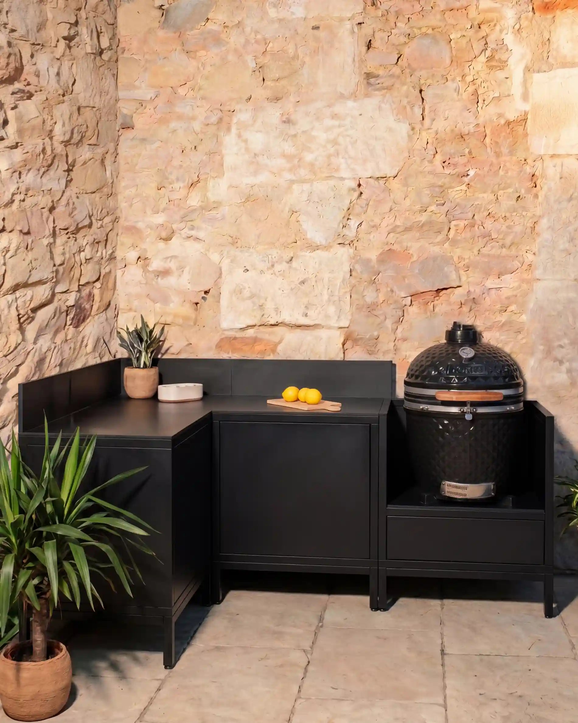 Kokko black outdoor corner kitchen with kamado and storage modules