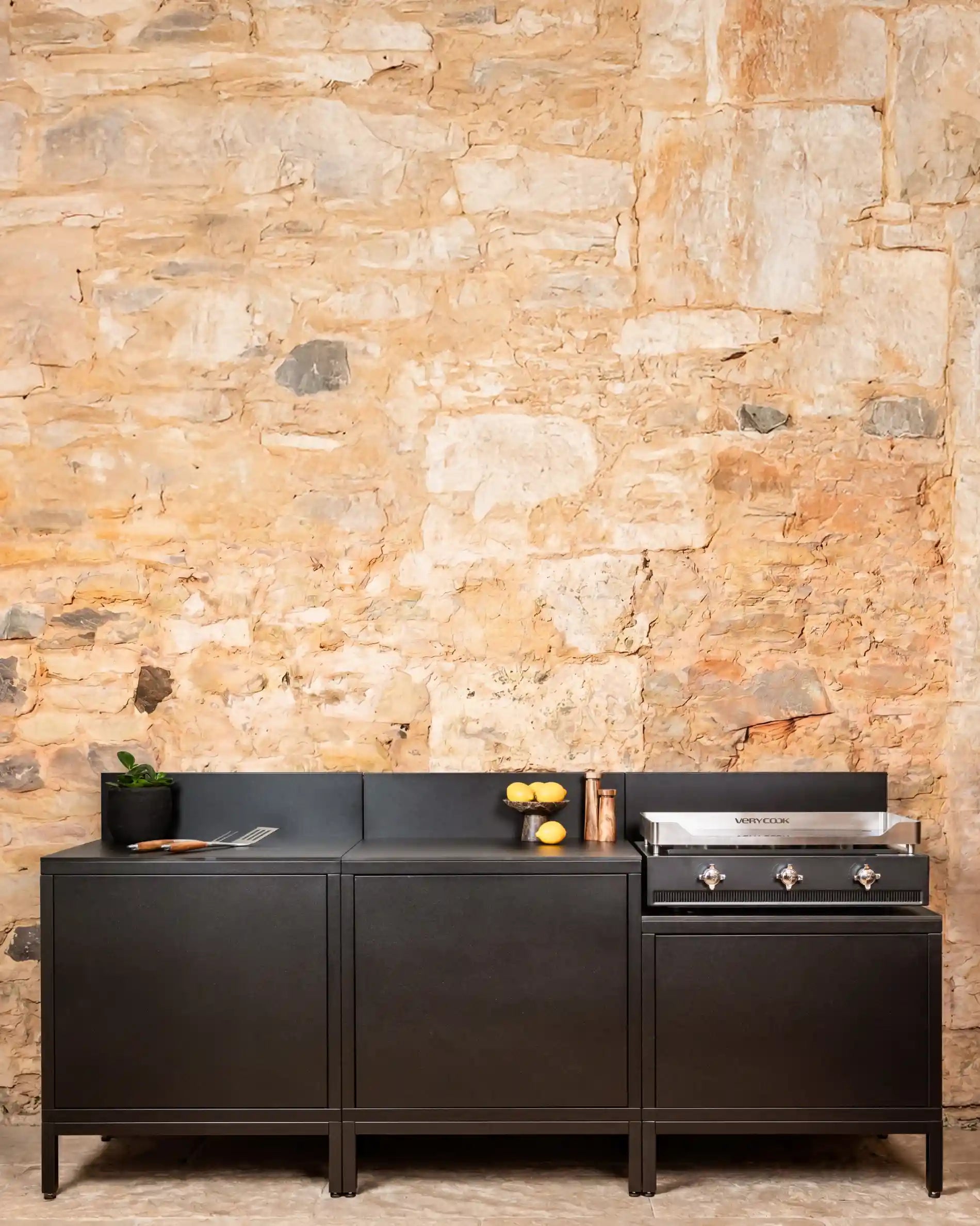 Kokko black outdoor kitchen with integrated plancha