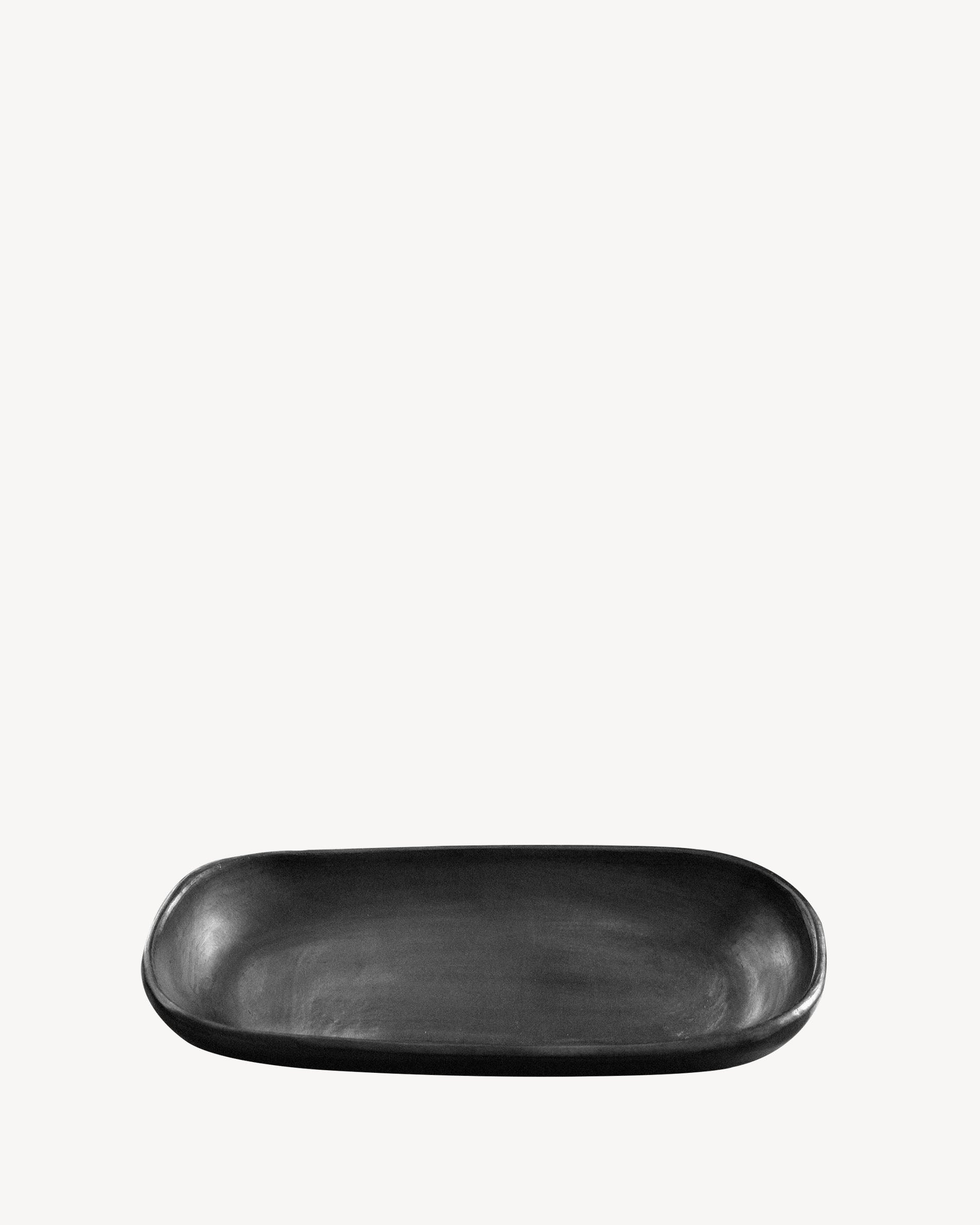 Chamba black clay cake dish