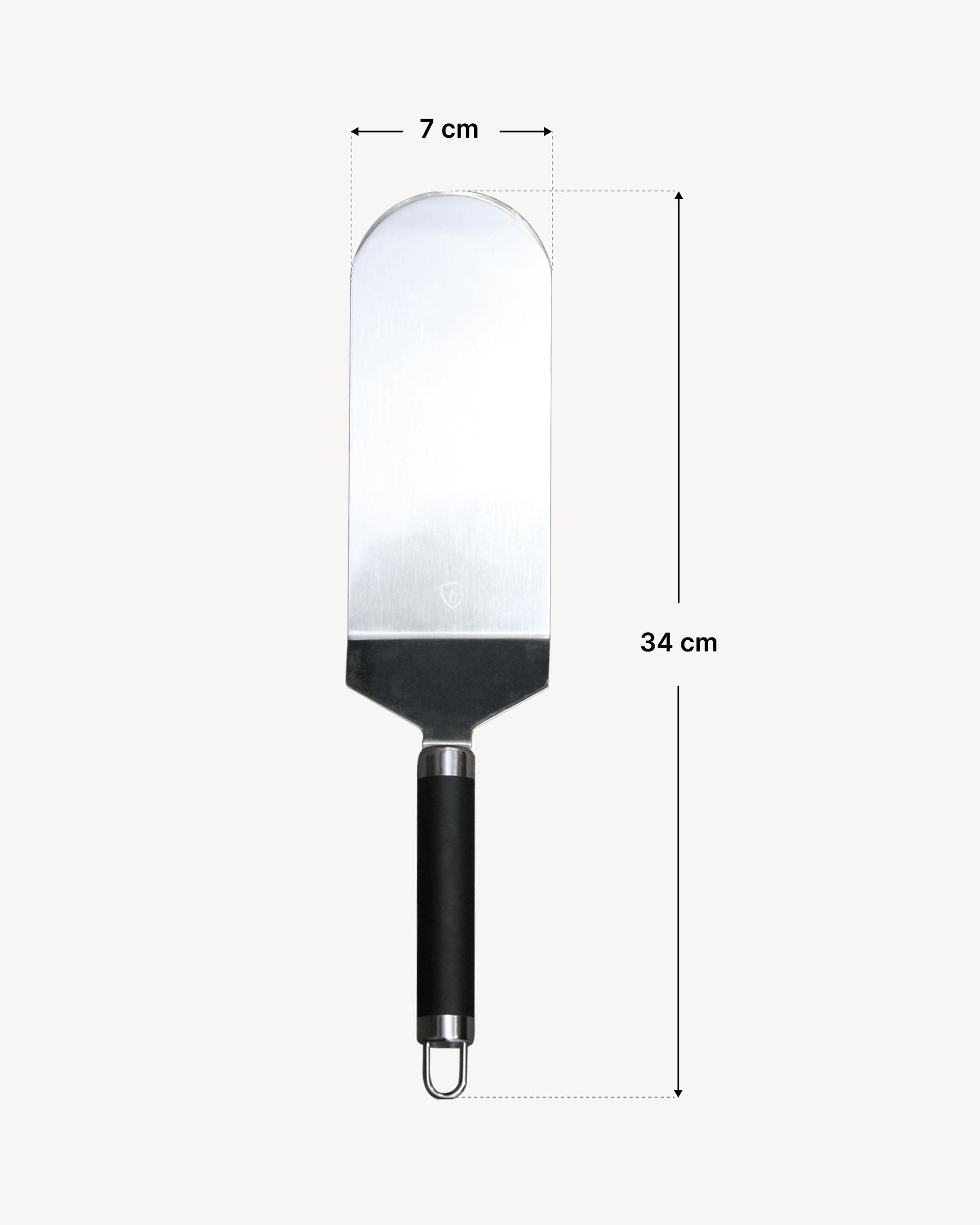 Stainless steel fish spatula with rounded blade and ergonomic black handle, shown on a light background with dimensions indicated: blade width 7 cm and total length 34 cm.